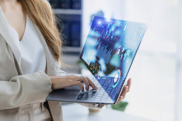 Technology and financial advisory services concert. Businesswoman working on digital laptop computer with advisor showing plan of investment to clients at office. Digital marketing.