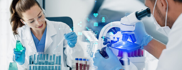 Professional scientist looking through a microscope in a laboratory with blood samples or tests,...