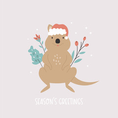 Christmas greeting card with funny quokka sitting in a Santa hat © danceyourlife