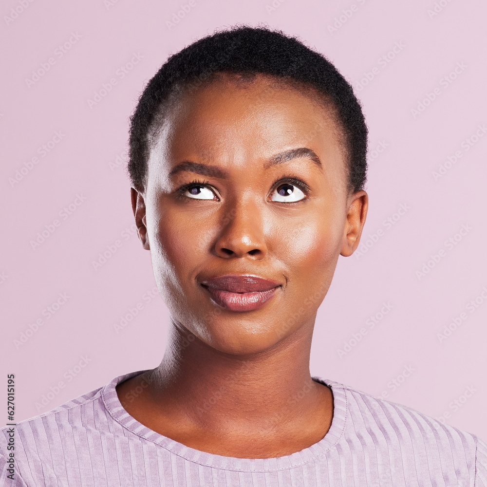 Wall mural Woman, annoyed and face in pink studio background with skin in africa for emoji. Female person, silly and faces with eye roll with thinking expression for beauty and skincare with smile for youth.