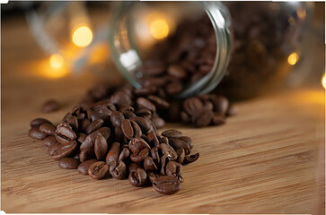 Coffee beans lies on a brown wooden table