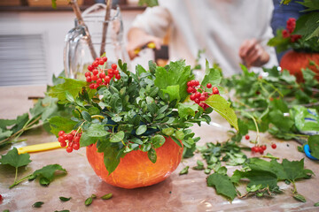 Master class on making bouquets. Autumn bouquet in a pumpkin. Flower arrangements, creating beautiful bouquets with your own hands