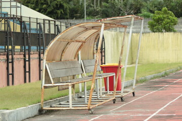 a bench on the green field, football stadium bench for team, Reserve and staff coach bench in sport stadium