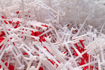 Recycling, reuse of plastic. Sprues from the production of plastic products. Recycled crushed plastic. The problem of environmental pollution. Ecology and innovations. Various types of color plastic