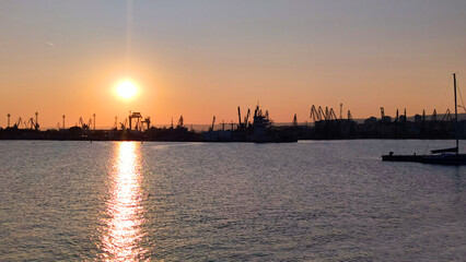 Naklejka premium Horizontal panorama of the seaport in Varna Bulgaria at sunset