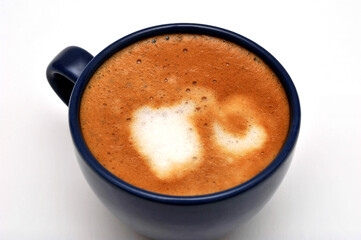 Delicious home-made cappuccino in a blue cup