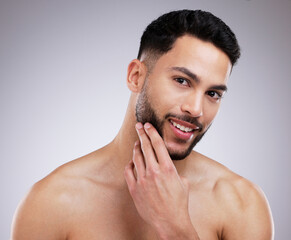 Skincare, grooming and portrait of happy man in studio with natural, beauty and face routine. Self...