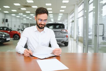 I have a new car. client signing car lease form.