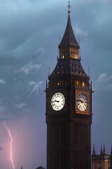 Big Ben with lightning in the background