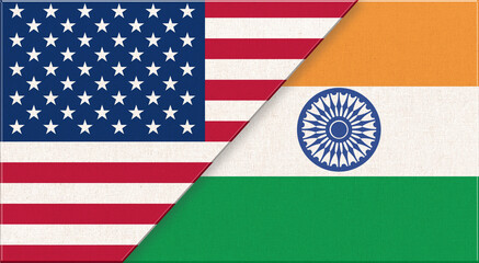 Flags of USA and India. American and Indian national flags on fabric surface.