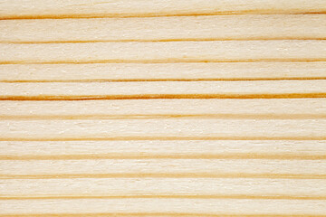 Wooden surface, close-up structure, processed, with horizontal parallel stripes are dark, background