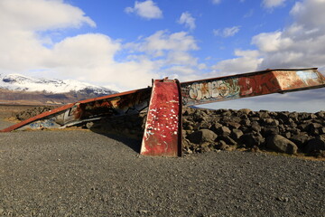 view of a wreck of an old bridge located in the Skaftafell National Park situated between...