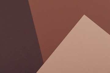 Multicolor background from a paper of different shades of brown. Geometric backdrop.