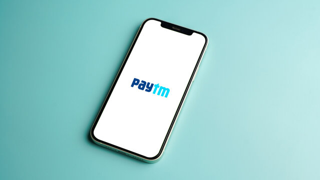 Paytm app on the mobile phone screen, online banking application: Kolkata, India - August 03 2023