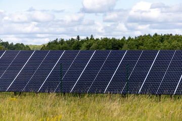 Strangnas, Sweden An array of solar panels in a field.
