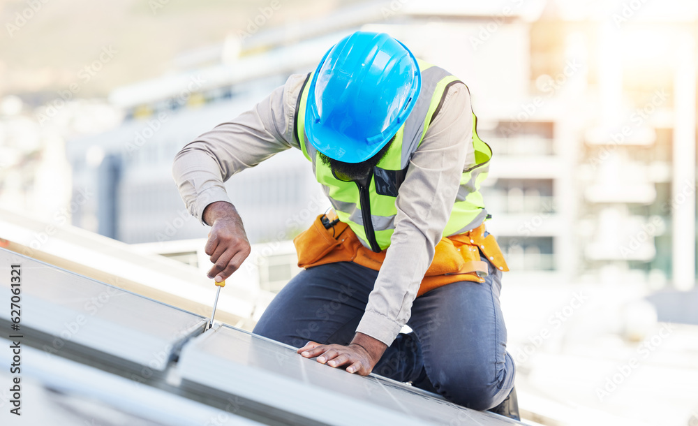 Poster Man, technician and screwdriver for solar panel installation on rooftop in the city for renewable energy. Male person, engineer or contractor working on roof in sun for installing eco friendly power