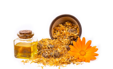 Herbal calendula officinalis in the glass and drop oil Isolated - obrazy, fototapety, plakaty