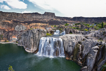 Shoshone Falls on the Snake River as viewed from the hiking trail. Twin Falls by Pillar Falls by...