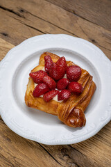 Delicious flavored pastries on a wooden table.  Close up