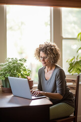A therapist conducting an online counseling session.
