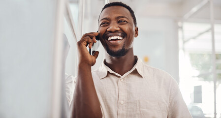 Yes, thats a deal. Shot of a young businessman talking on a cellphone in an office.