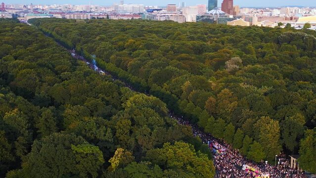 Smooth aerial top view flight CSD Pride Parade 2023 Berlin Crowd Gay Party