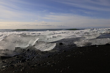 View of a blocks of ice on diamond beach south of Vatnajökull glacier between Vatnajökull National Park and the town of Höfn in southern Iceland