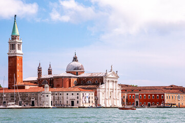 Fototapeta na wymiar Front view, far distance of, St. Mark's Basilica and other historic buildings, on grand canal, Venice, Italy