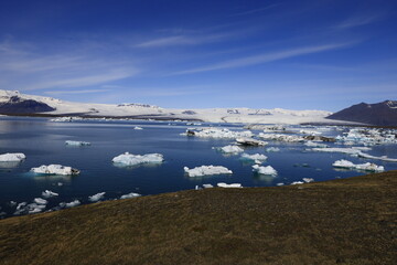 Fototapeta premium Jökulsárlón is a large glacial lake located in the south of the Vatnajökull glacier between the Vatnajökull National Park and the town of Höfn,appeared between 1934 and 1935