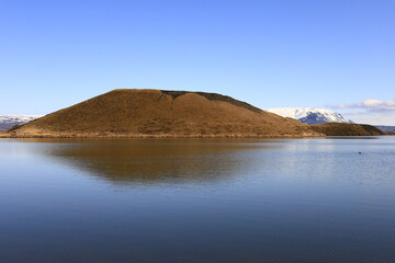 Mývatn is a shallow lake located in an area of active volcanism in northern Iceland, near the Krafla volcano