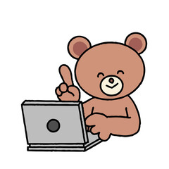 パソコン作業をするクマが笑顔で指差し