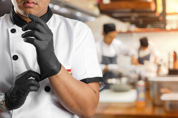 Asian Chef Embracing Culinary Passion | Ready to Craft Gastronomic Delights | Kitchen Ambience