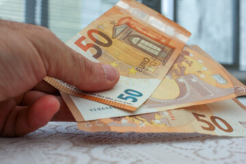 fifty euro notes in my hand