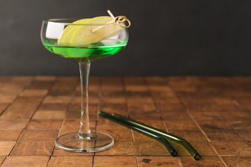 Classik Apple martini - appletini, cold summer cocktail with gin, apple liqueur, dry vermouth and...