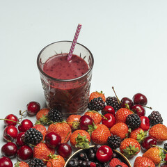 A detox juice in a grated glass made of forest fruits