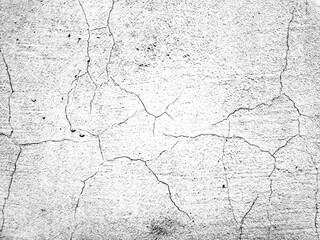 Aged concrete wall with rough grunge texture, showing cracks and weathered marks. Distinctive overlay template, stencil effect for artistic designs
