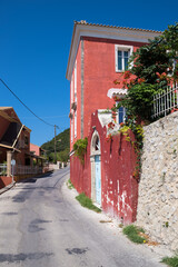 Street with old buildings in Lakones village, Corfu, Greece
