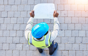 Construction worker, man and building inspection blueprint with industrial employee from above....