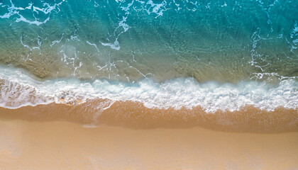 Beach Sand Sea Shore with Blue wave and white foamy summer background, Aerial beach top view overhead seaside.