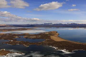 Mývatn is a shallow lake located in an area of active volcanism in northern Iceland, near the Krafla volcano