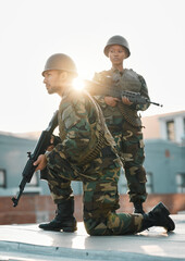 Fototapeta premium Army, training and people with gun, defense or power on rooftop for aim, shooting or practice. Military, weapon and black woman with man soldier and sniper rifle for war, target or protection team