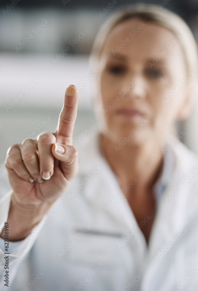 Poster she pushes all the right buttons. cropped shot of a mature female scientist working on touchscreen t