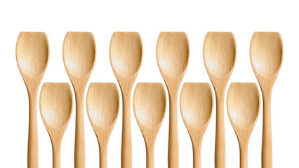 Group pattern of wooden cooking spoons isolated on white background.