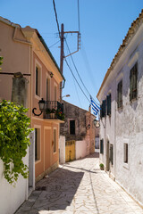 Fototapeta na wymiar Street in pretty Makrades village, Corfu, Greece