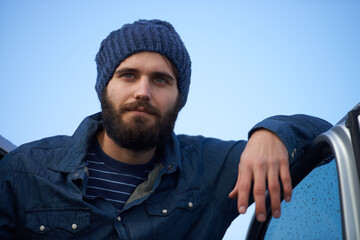 Ready to hit the road. A handsome traveller ready to embark on an adventure.