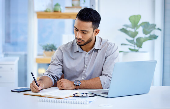 Young Business Man, Writing And Book With Laptop, Notes Or Schedule Planning At Web Design Job. Businessman, Notebook And Computer With Ideas, Brainstorming Or Problem Solving For Report In Workplace