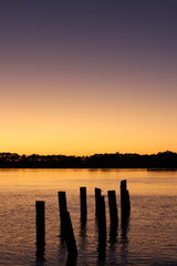 Jacksonville Pier during sunset off the ocean in Jacksonville, Florida. 