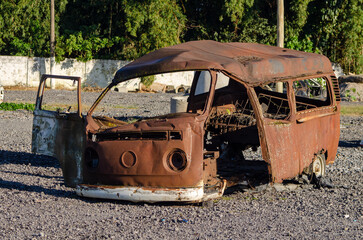 Old hippie truck crashed in junkyard