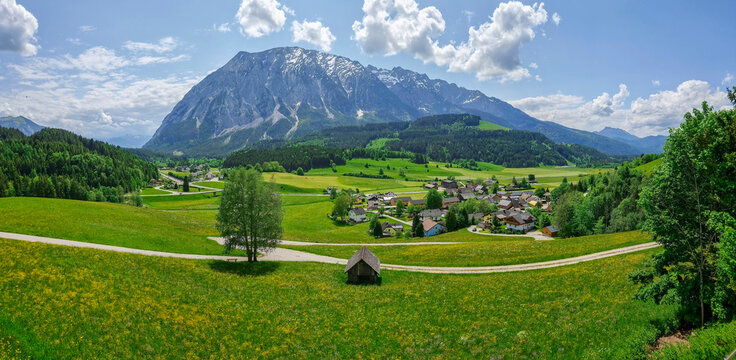 Summer austrian landscape with Grimming mountain (2.351 m), an isolated peak in the Dachstein Mountains, view from small alpine village Tauplitz, Styria, Austria