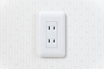 Outlet mounted on the wall.